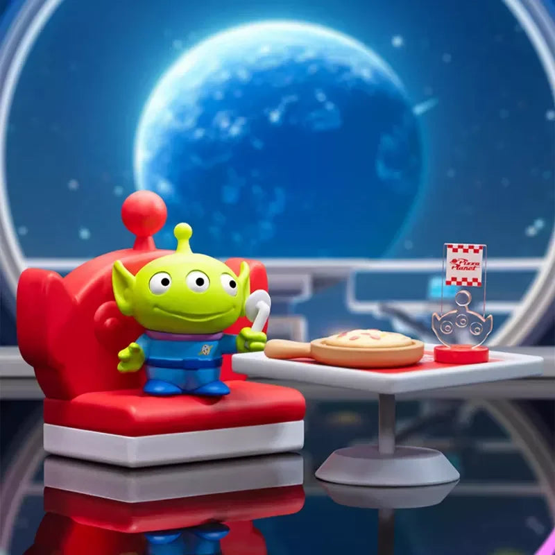 Figurine Alien - Fauteuil Rouge Vue sur la Terre