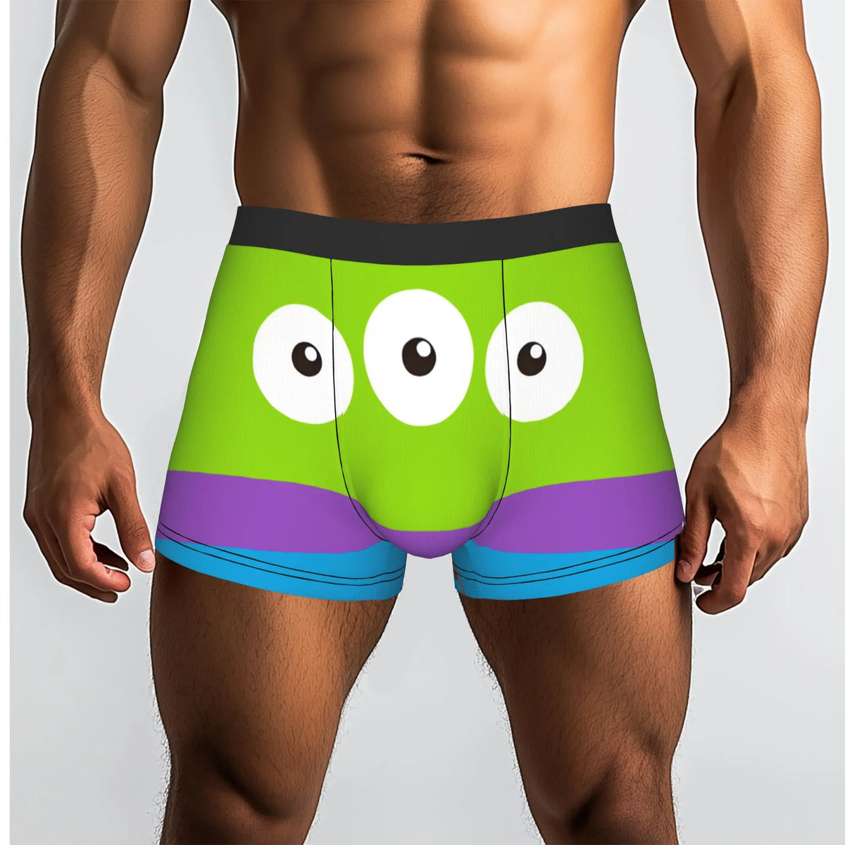 Alien-Boxershorts – Drei-Augen-Gesicht mit lila und blauen Streifen am Kragen