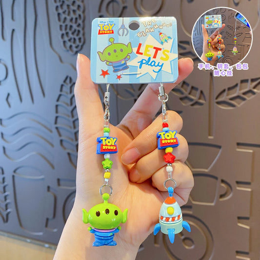 Alien und Raketen-Schlüsselanhänger – Pizza Planet Beads Duo